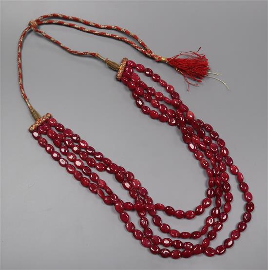 An Indian four strand ruby bead necklace